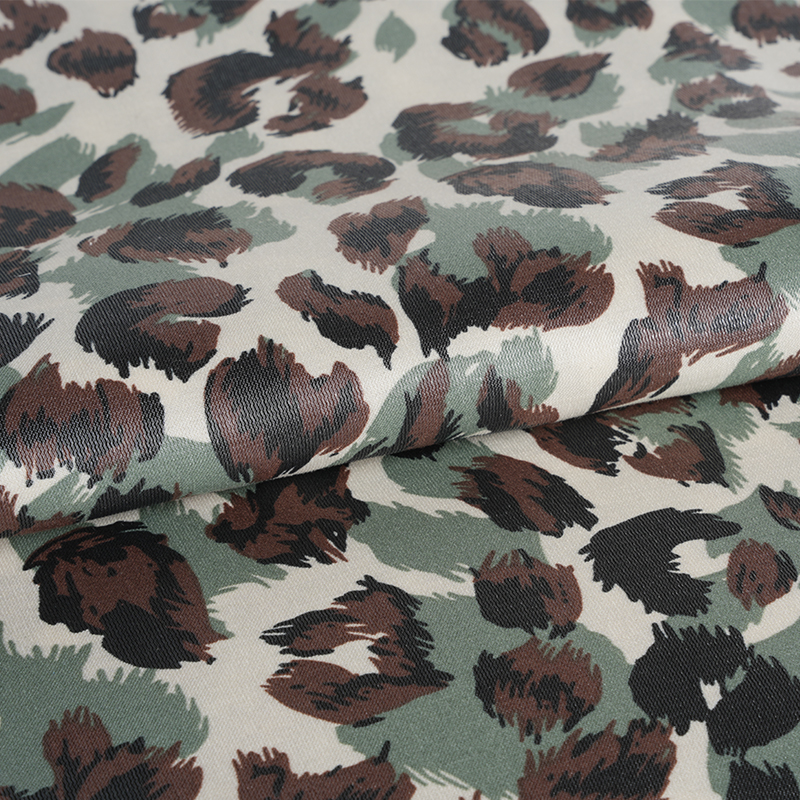 20D*21S engrossou tecido dourado de algodão com estampa de leopardo de três cores