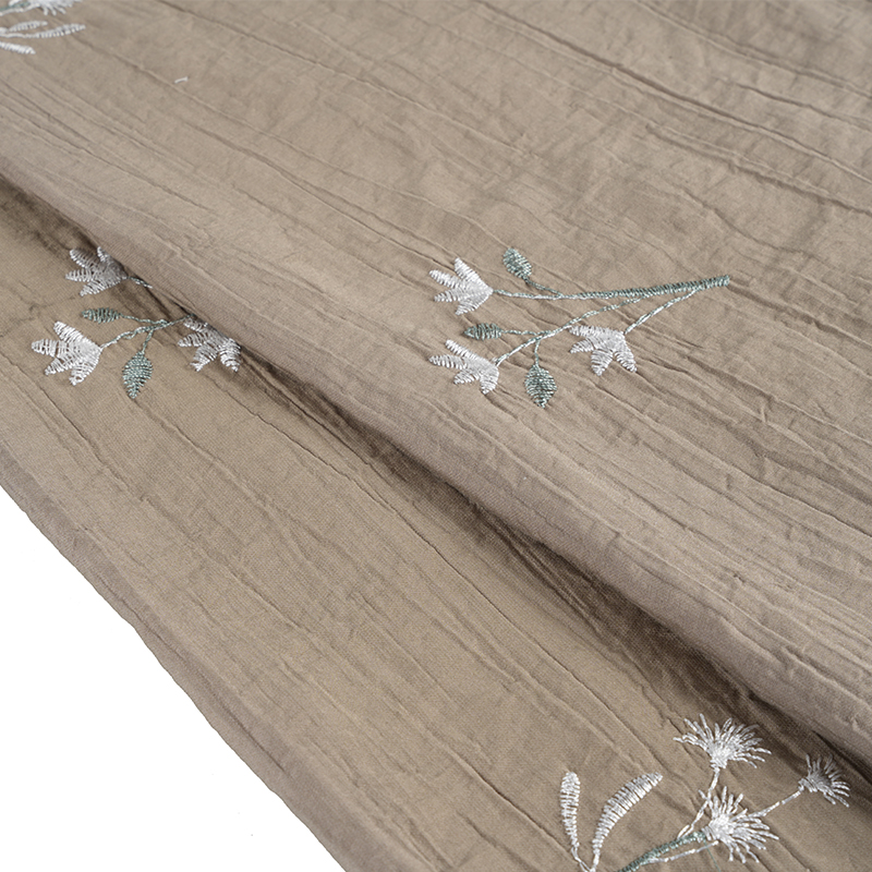 Tecido enrugado com flor de bordado de orquídea com semente de pêssego